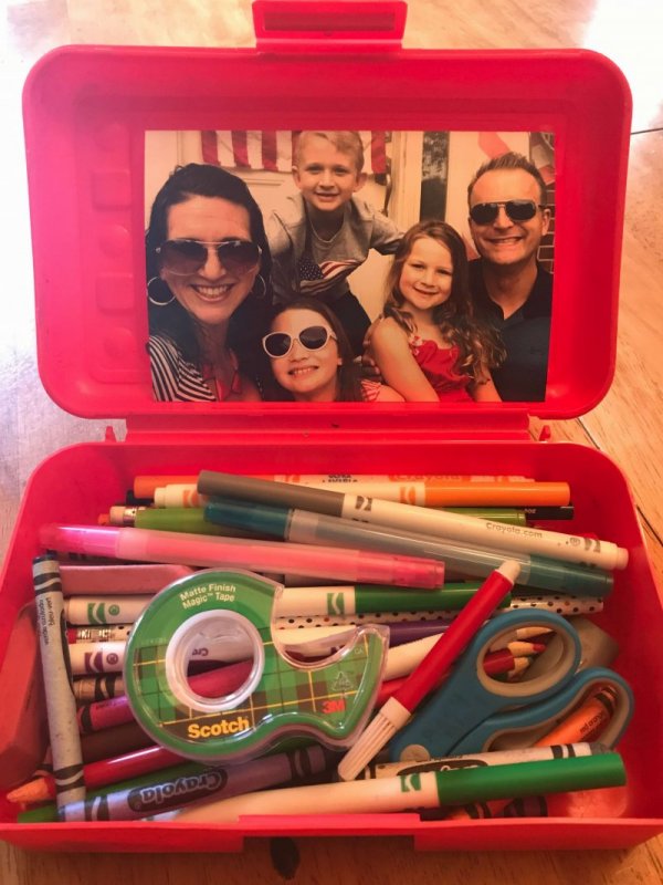 Sneaking a family picture into your child's school supply box can help ease anxiety and homesickness. www.coffeeandcarpool.com