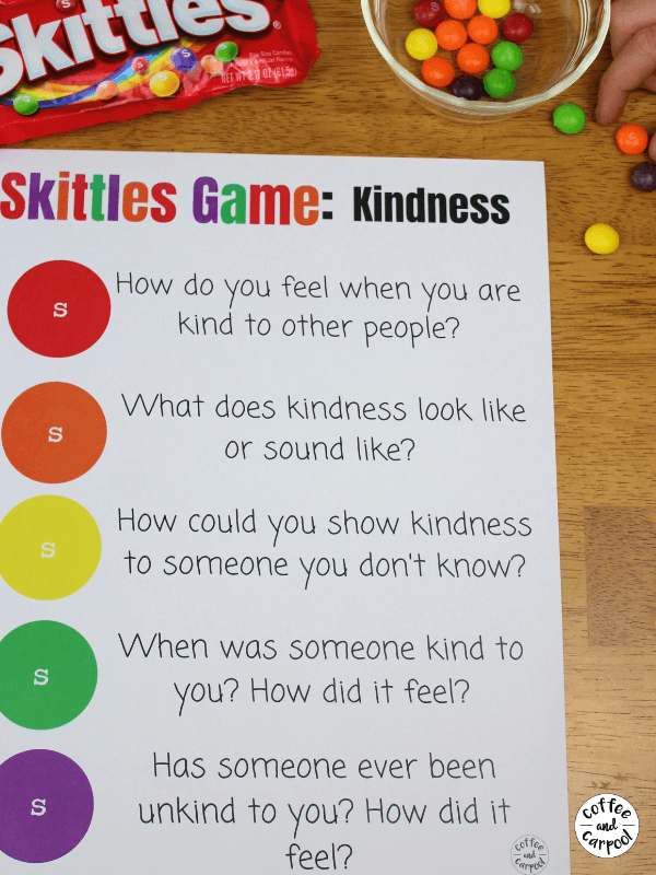 This kindness game played with Skittles will help kids talk about kindness in meaningful ways. It's perfect for a group of kids in a classroom, Boy Scouts or Girl Scouts, or at family dinner time for family discussions. All you need is a few pieces of candy and you'll be talking about kindness because kindness matters. This Skittles Kindness Game by Coffee and Carpool is one of the most helpful kindness activities for kids!