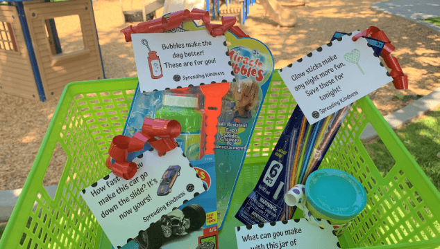 Random acts of kindness for kids perfect for a summer activity for kids. These free printables and dollar store toys will spread kindness this summer when you hide them at your local park. #raks #randomactsofkindnessforkids #summer #kindness #summeractivities #summeractivity #kindkids #coffeeandcarpool #freeprintable #kids
