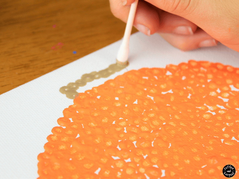 Pumpkin Pointillism art with tiny dots perfect for fall