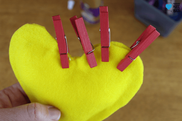 Then continue to sew the two hearts together. 
